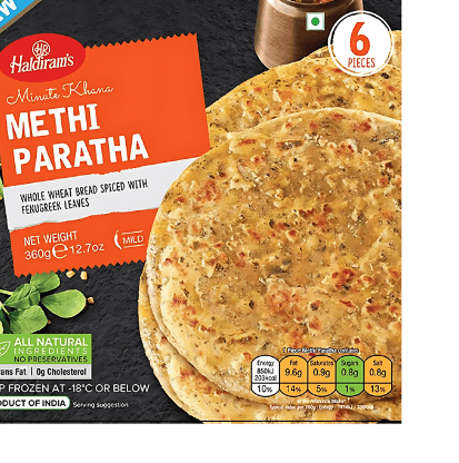 Packaged Methi Paratha with Haldiram's branding on a black background