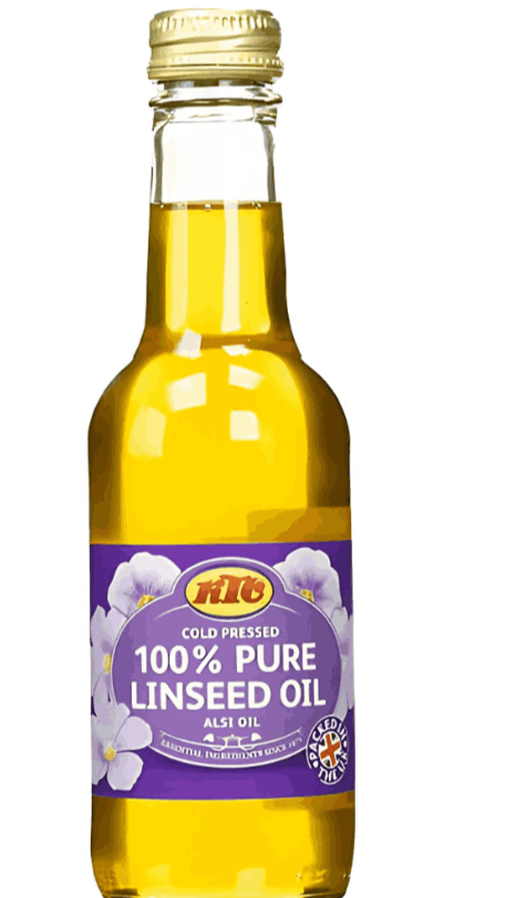 Bottle of 100% pure linseed oil with a purple label on a white background, featuring the Desi Mart brand.